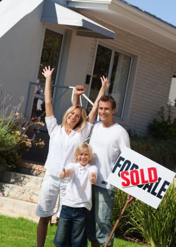 Happy family buying a house