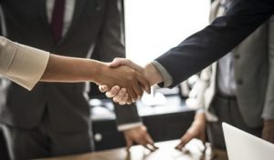 agreement hands shake business