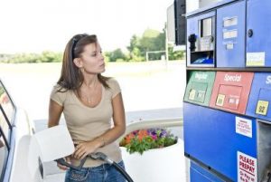 Young Woman Buying Fuel